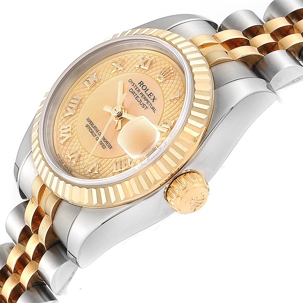This image shows a close-up side angle of a Rolex Datejust 179173 Women
s Steel and Gold (two tone) Mother of Pearl Dial 179173 Women
s Steel and Gold (two tone) Mother of Pearl Dial watch, highlighting the crown, bezel, dial, and part of the bracelet.