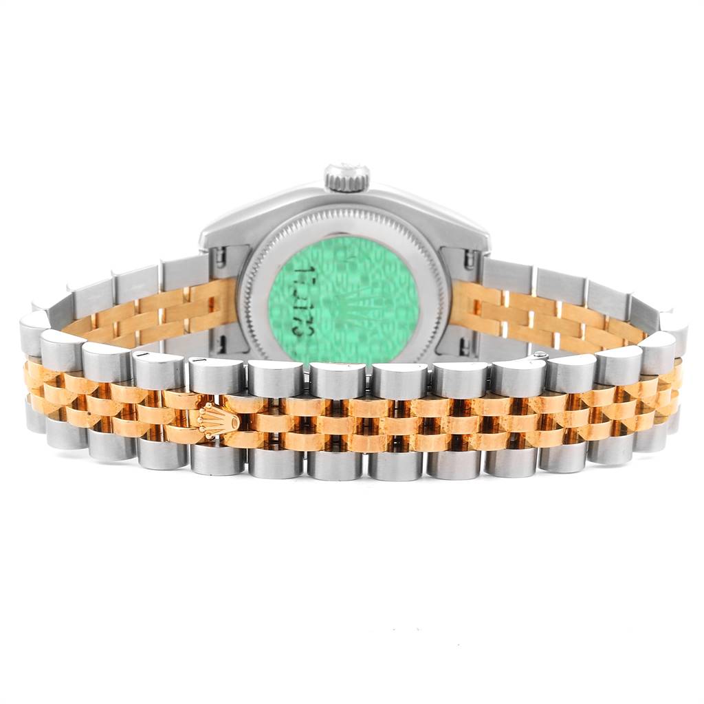 This image shows the back view of a Rolex Datejust 179173 Women
s Steel and Gold (two tone) Mother of Pearl Dial 179173 Women
s Steel and Gold (two tone) Mother of Pearl Dial watch, including its case and two-tone bracelet.