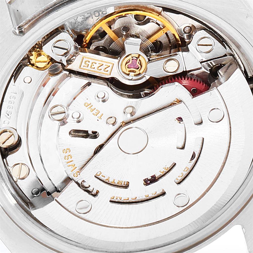 This image shows a close-up view of the Rolex Datejust 179174 Women
s Stainless Steel Silver Dial 179174 Women
s Stainless Steel Silver Dial watch
s intricate internal movement mechanism.