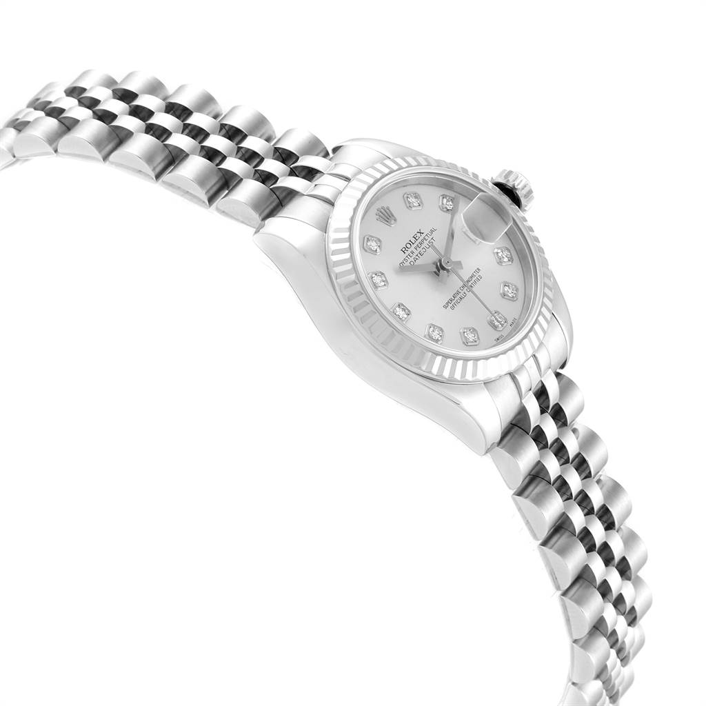 The image shows a side view of a Rolex Datejust 179174 Women
s Stainless Steel Silver Dial 179174 Women
s Stainless Steel Silver Dial watch, displaying the dial, crown, and part of the bracelet.