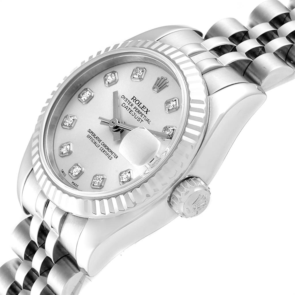 The image shows a side angle of a Rolex Datejust 179174 Women
s Stainless Steel Silver Dial 179174 Women
s Stainless Steel Silver Dial watch, featuring a diamond-set dial, fluted bezel, and jubilee bracelet.
