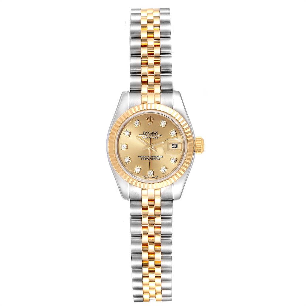 The image shows a Rolex Datejust 179173 Women's Steel and Gold (two tone) Champagne Dial 179173 Women's Steel and Gold (two tone) Champagne Dial watch from a top-down view, highlighting its gold and silver bracelet, fluted bezel, and champagne dial.