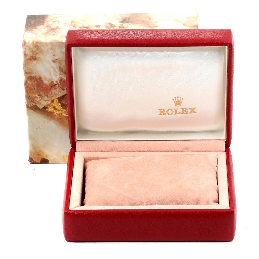 This image shows an open Rolex Datejust 69173 Women's Stainless Steel Black Dial 69173 Women's Stainless Steel Black Dial watch box with a padded interior and the Rolex logo on the inside.