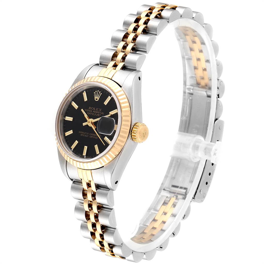 The Rolex Datejust 69173 Women's Stainless Steel Black Dial 69173 Women's Stainless Steel Black Dial watch is shown at an angle highlighting its black dial, fluted bezel, and two-tone bracelet.