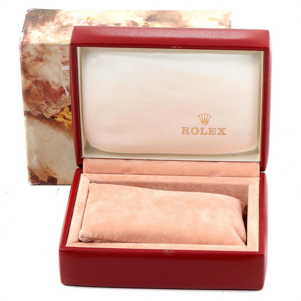 The image shows a Rolex Datejust 69173 Women's Stainless Steel Blue Dial 69173 Women's Stainless Steel Blue Dial watch box, open, displaying its interior lining and cushion for holding the watch.