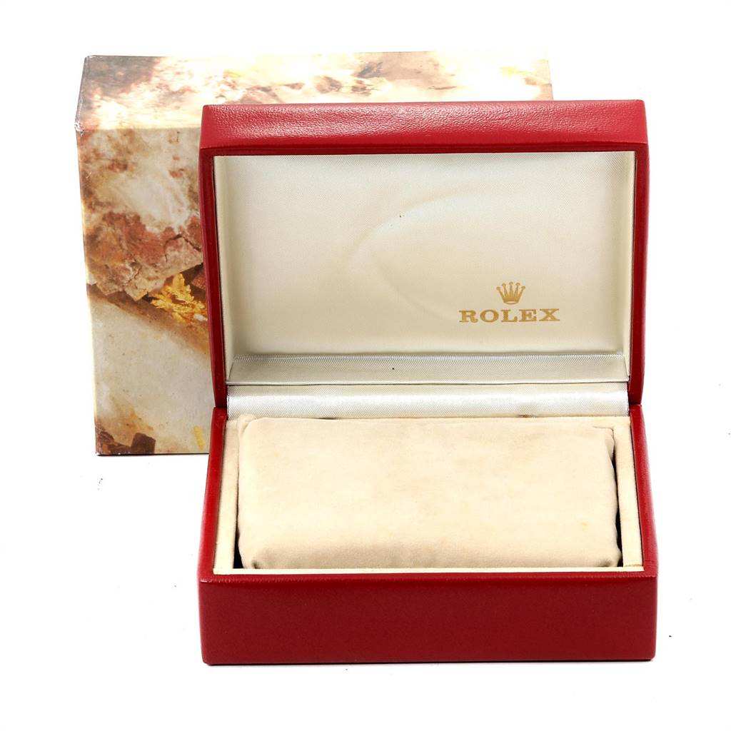 The image shows an open Rolex Datejust 69173 Women's Stainless Steel Champagne Dial 69173 Women's Stainless Steel Champagne Dial watch box with a beige cushion inside and the Rolex logo on the interior lid.