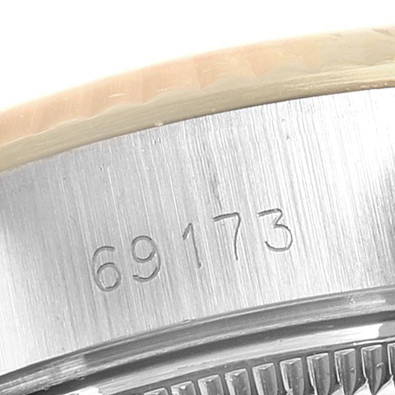 This close-up image shows the model number "69173" engraved on the case side of a Rolex Datejust 69173 Women's Stainless Steel Blue Dial 69173 Women's Stainless Steel Blue Dial watch.