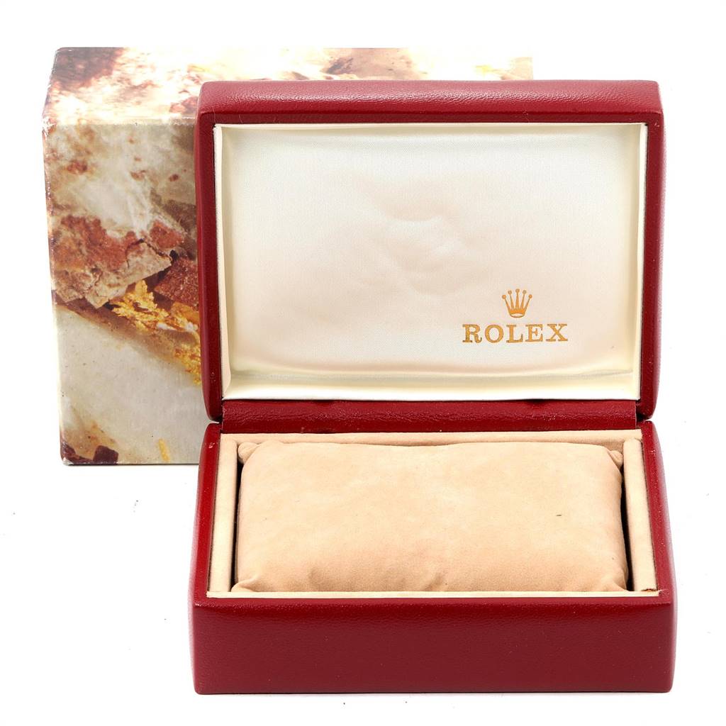 The image shows an empty open box for a Rolex Datejust 69173 Women's Stainless Steel Blue Dial 69173 Women's Stainless Steel Blue Dial watch, with the inside displaying the brand's logo.