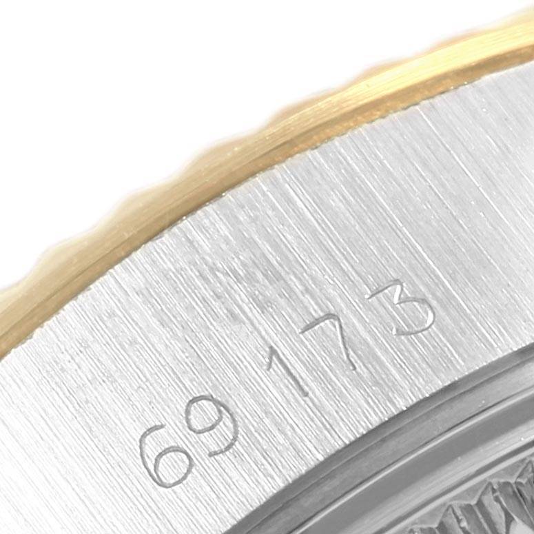 The image shows a close-up of the bezel and case with the model number inscribed on a Rolex Datejust 69173 Women's Stainless Steel Champagne Dial 69173 Women's Stainless Steel Champagne Dial watch.