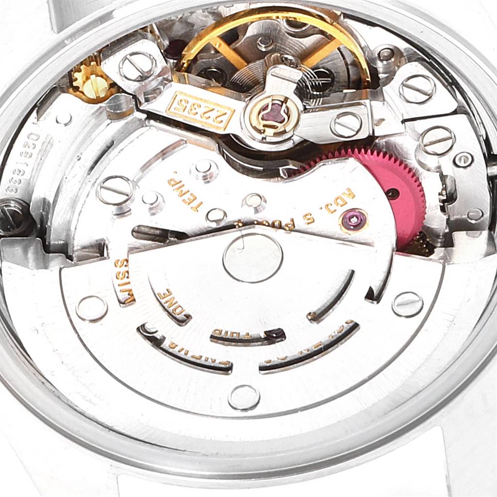The image shows a close-up view of the movement mechanism of a Rolex Datejust 79173 Women
s Steel and Gold (two tone) Blue Dial 79173 Women
s Steel and Gold (two tone) Blue Dial watch.
