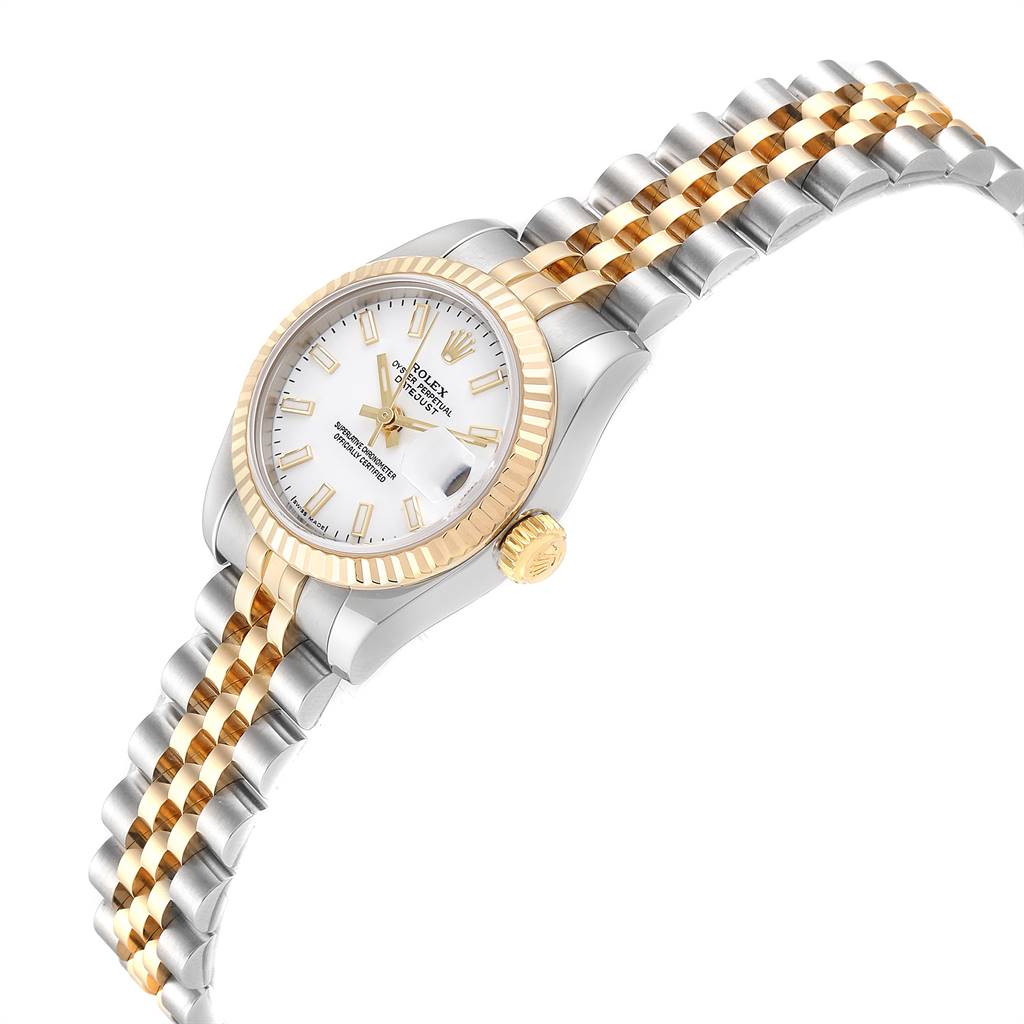 The image displays a Rolex Datejust 179173 Women's Steel and Gold (two tone) White Dial 179173 Women's Steel and Gold (two tone) White Dial watch at an oblique angle, highlighting its dial, fluted bezel, and two-tone bracelet.