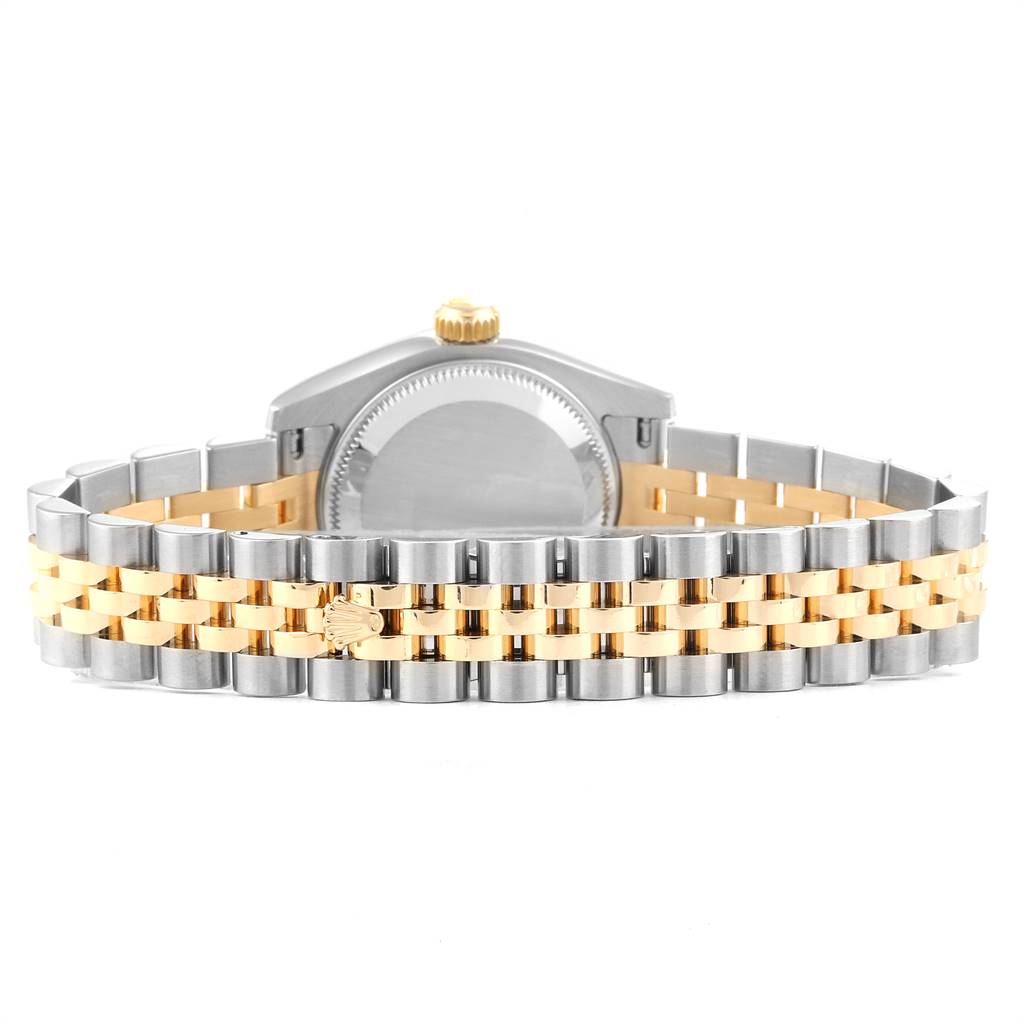 The image shows the backside and bracelet of the Rolex Datejust 179173 Women's Steel and Gold (two tone) White Dial 179173 Women's Steel and Gold (two tone) White Dial watch, highlighting its two-tone metal design.