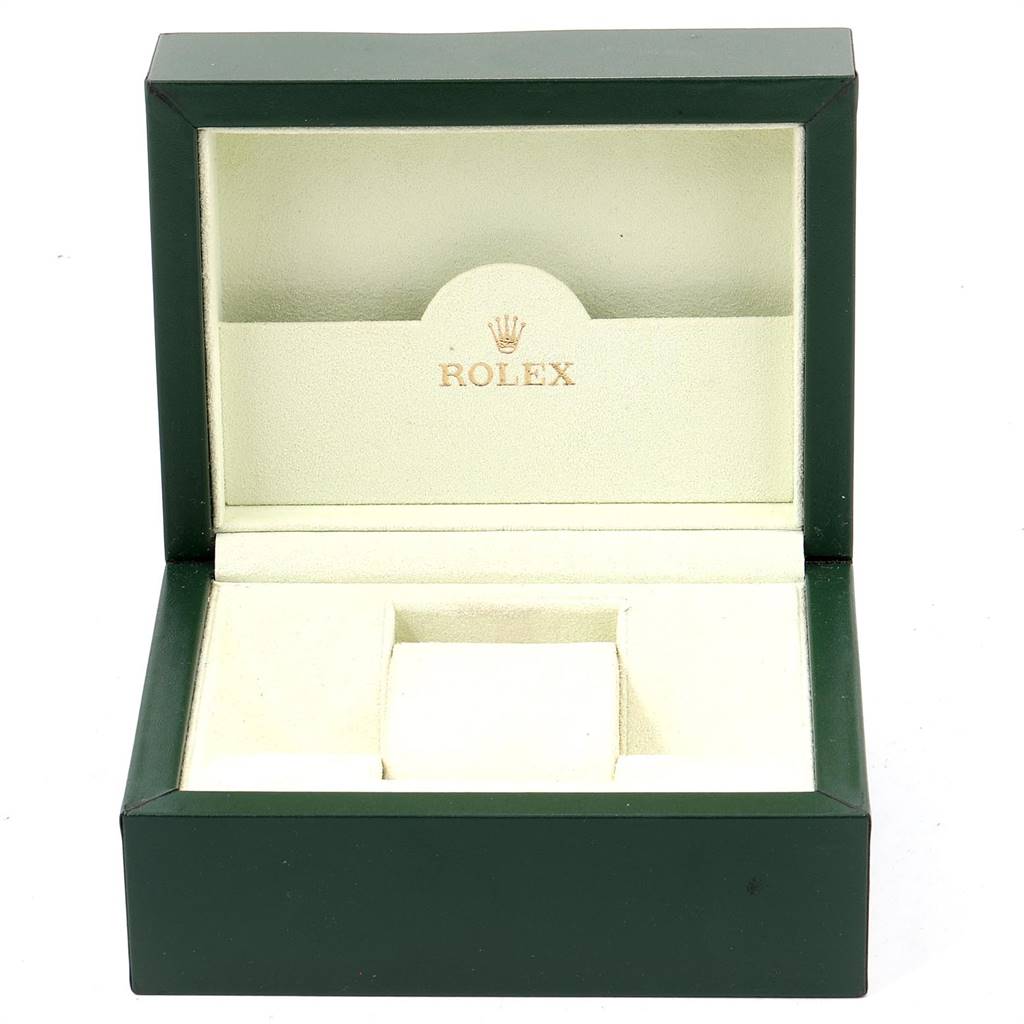 The image shows an open green and gold Rolex box for a Datejust model watch, without the watch inside.