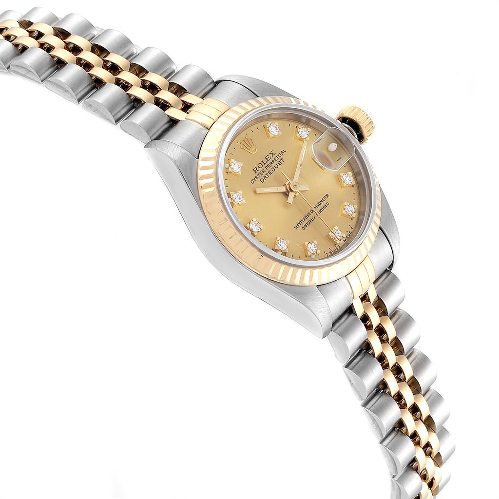 The Rolex Datejust 69173 Women's Stainless Steel Champagne Dial 69173 Women's Stainless Steel Champagne Dial watch is shown at a three-quarter angle, highlighting its gold dial, diamond hour markers, and two-tone bracelet.