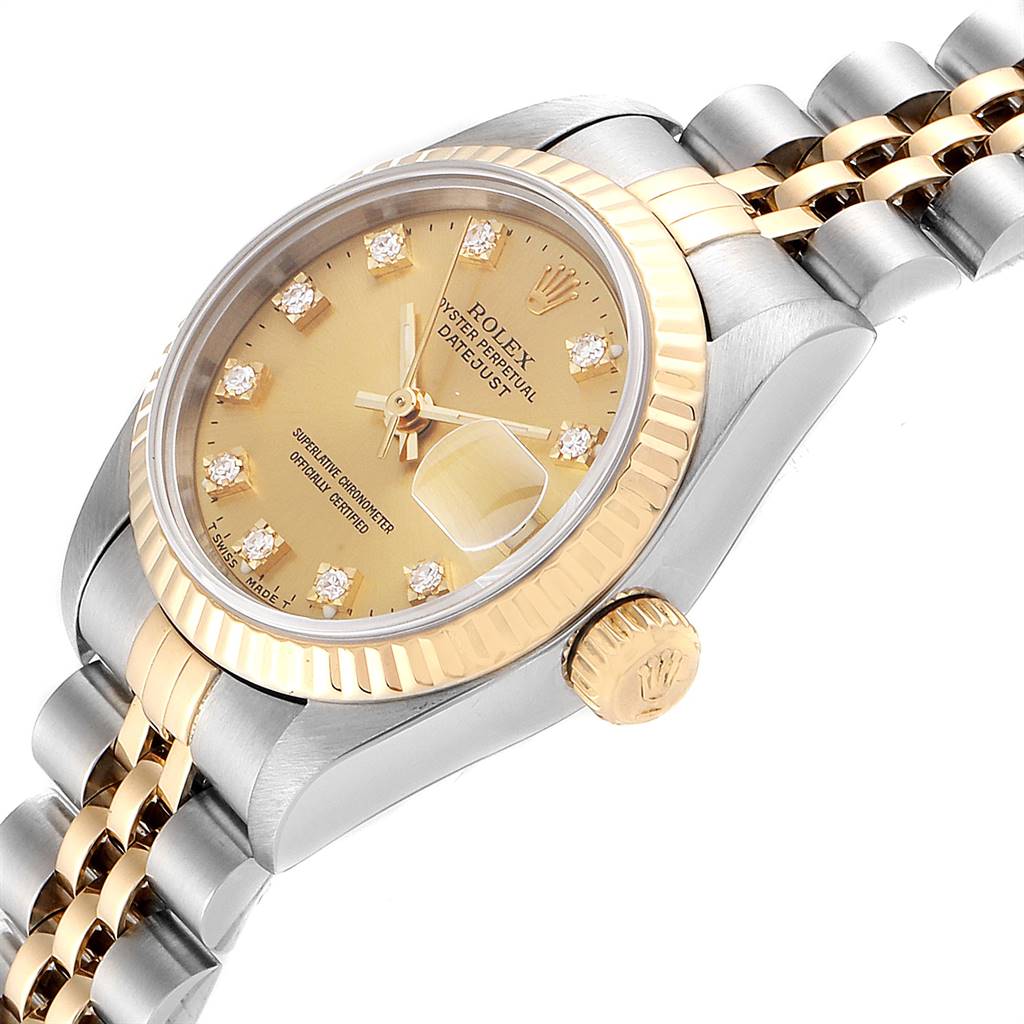 This image shows a close-up of a Rolex Datejust 69173 Women's Stainless Steel Champagne Dial 69173 Women's Stainless Steel Champagne Dial watch, highlighting its gold bezel, crown, and dual-tone bracelet, viewed at an angle from the side.