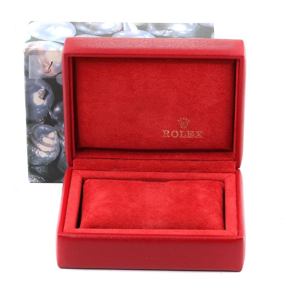 The image shows an open red Rolex watch box with the Rolex logo, used for a Datejust model.