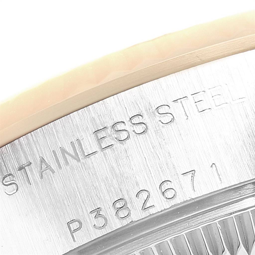 This image shows a close-up of the stainless steel case back with serial number engraving on a Rolex Datejust 79173 Women's Stainless Steel Silver Dial 79173 Women's Stainless Steel Silver Dial watch.