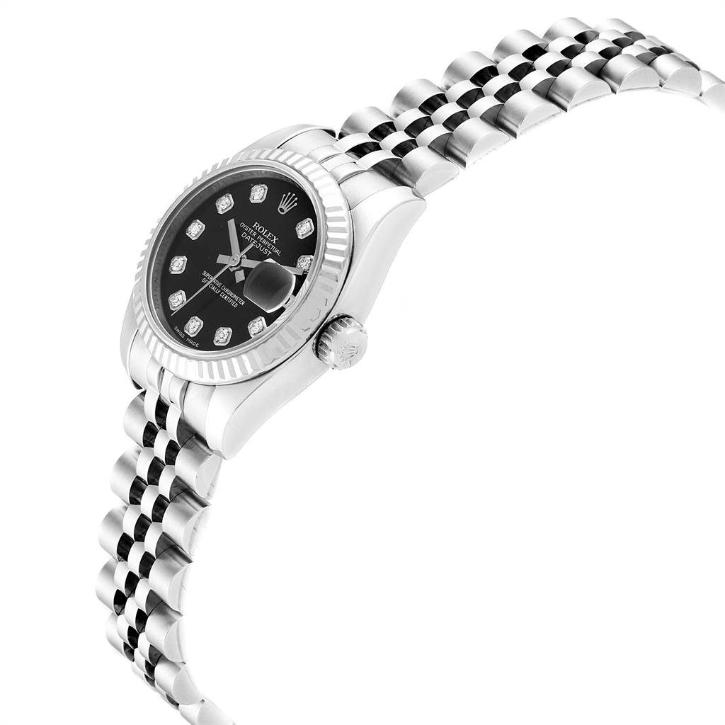 The image shows a side view of a Rolex Datejust 179174 Women
s Stainless Steel Black Dial 179174 Women
s Stainless Steel Black Dial watch, highlighting its black dial, diamond markers, fluted bezel, and Jubilee bracelet.