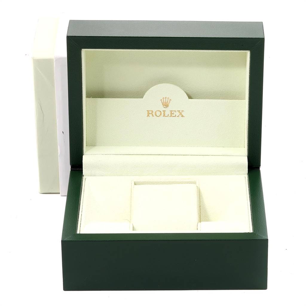 The image shows an open green Rolex Datejust 179174 Women
s Stainless Steel Black Dial 179174 Women
s Stainless Steel Black Dial watch box with the brand name and logo inside.