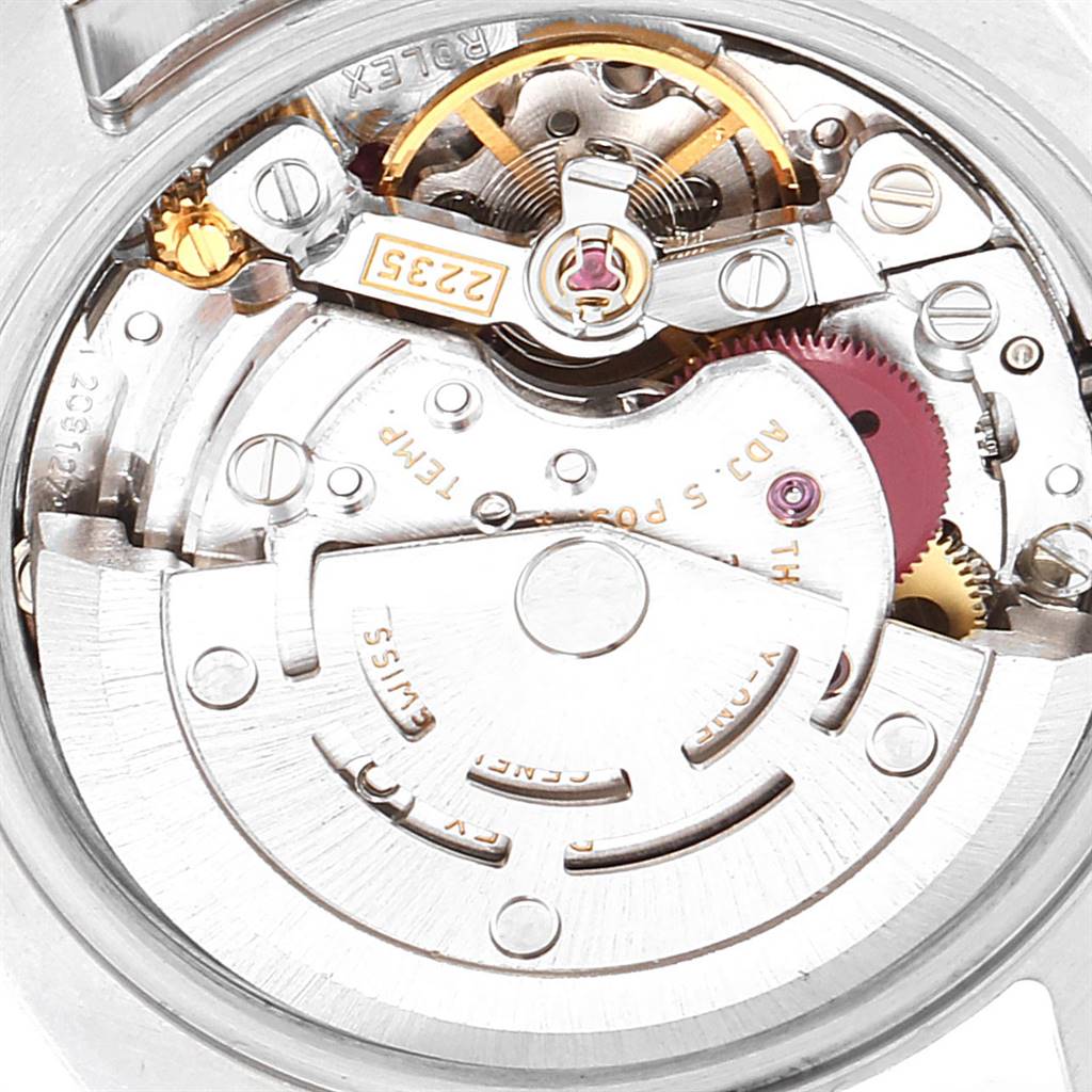 This image shows an up-close view of the movement mechanism inside a Rolex Datejust 179174 Women's Stainless Steel Pink Dial 179174 Women's Stainless Steel Pink Dial watch.