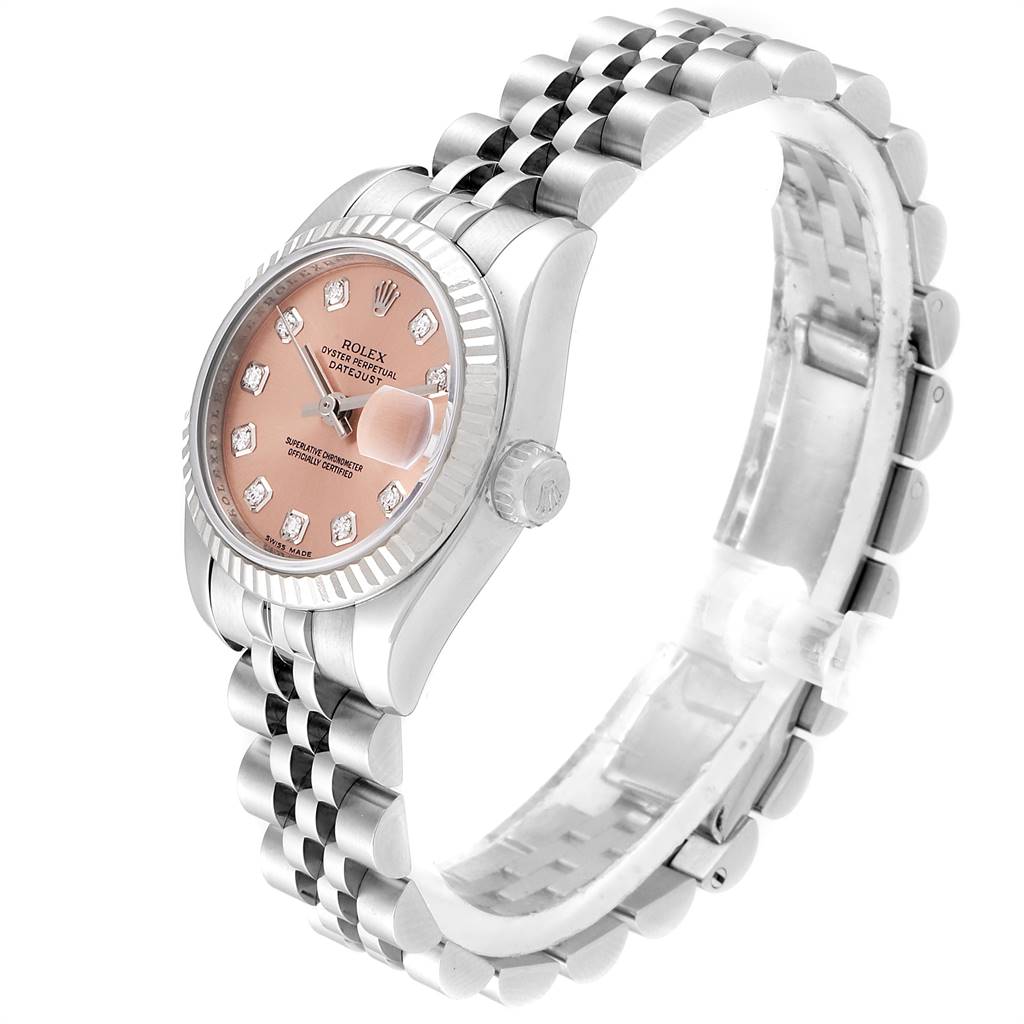 This image shows a Rolex Datejust 179174 Women's Stainless Steel Pink Dial 179174 Women's Stainless Steel Pink Dial watch at a three-quarter angle, highlighting its pink dial, diamond markers, and jubilee bracelet.