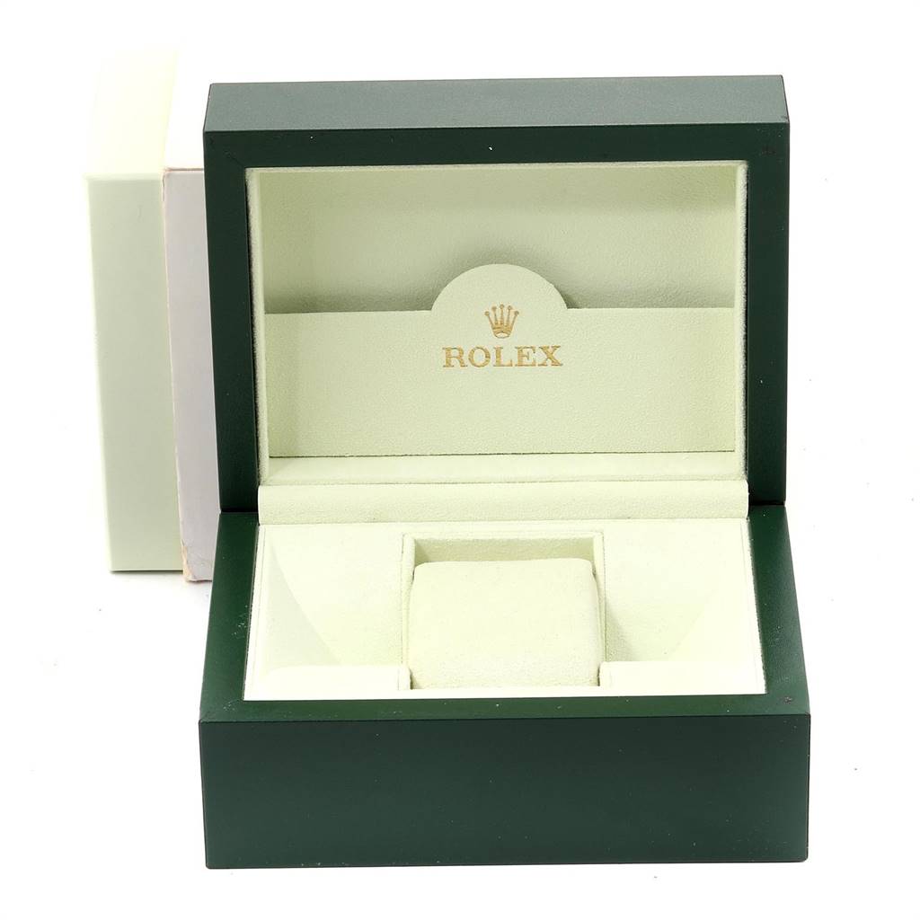 This image shows an empty green Rolex Datejust 179174 Women's Stainless Steel Pink Dial 179174 Women's Stainless Steel Pink Dial watch box from a front angle, with the lid open.