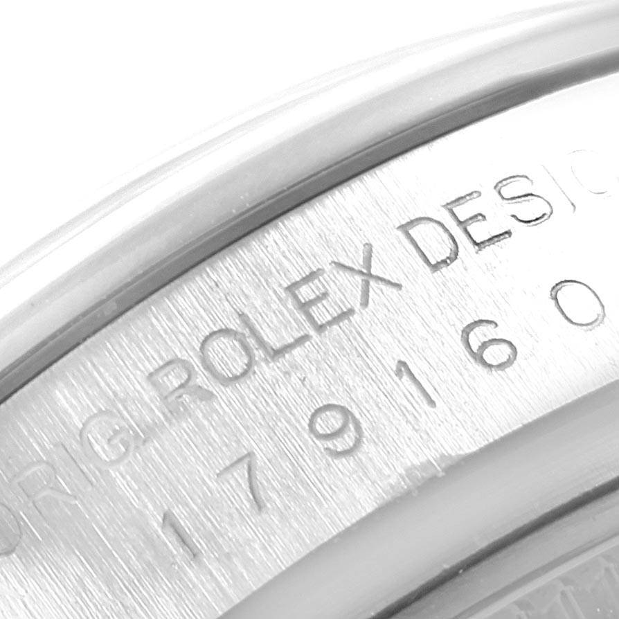 This image shows a close-up of the engraved side of a Rolex Datejust 179160 Women's Stainless Steel White Dial 179160 Women's Stainless Steel White Dial watch case.