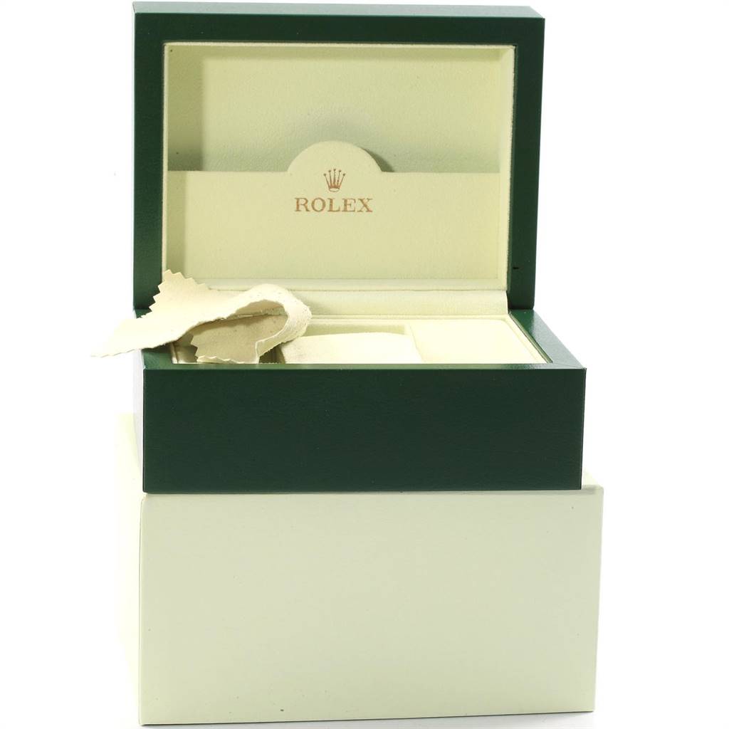 This image shows an open box for a Rolex Datejust 179160 Women's Stainless Steel White Dial 179160 Women's Stainless Steel White Dial watch with a cleaning cloth inside.