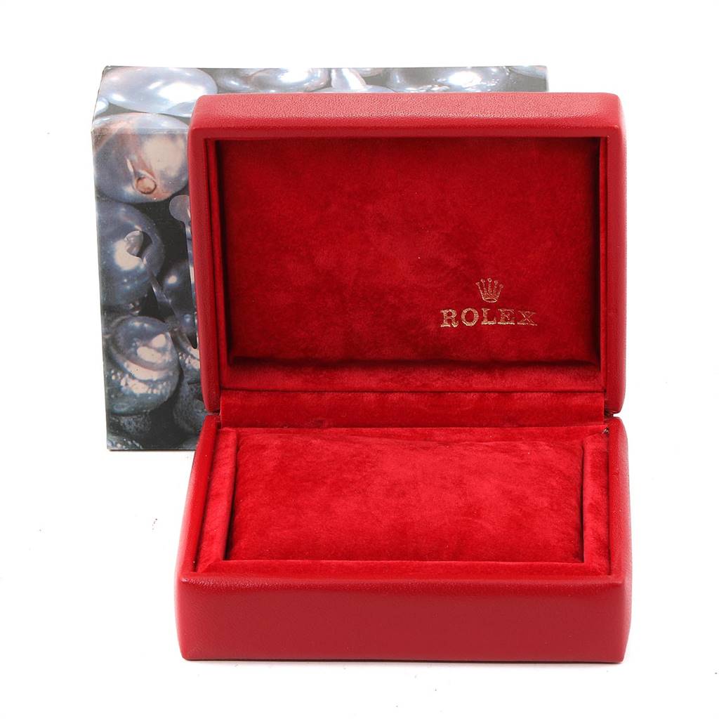 The image shows a red Rolex Datejust 69174 Women's Stainless Steel Silver Dial 69174 Women's Stainless Steel Silver Dial watch box in an open position, revealing the velvet interior.