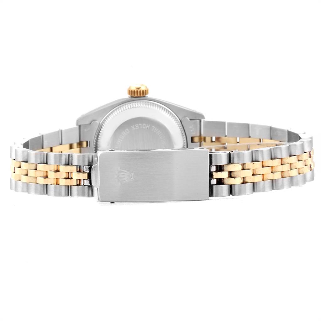 The image shows the back view of a Rolex Datejust 6917 Women's Steel and Gold (two tone) Champagne Dial 6917 Women's Steel and Gold (two tone) Champagne Dial watch, highlighting its clasp and two-tone bracelet.