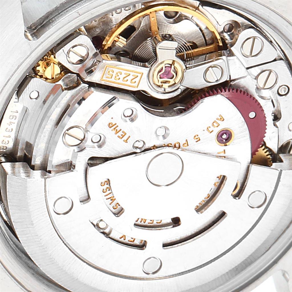 This image shows the movement mechanism of a Rolex Datejust 179173 Women's Steel and Gold (two tone) Silver Dial 179173 Women's Steel and Gold (two tone) Silver Dial watch at a close-up angle.