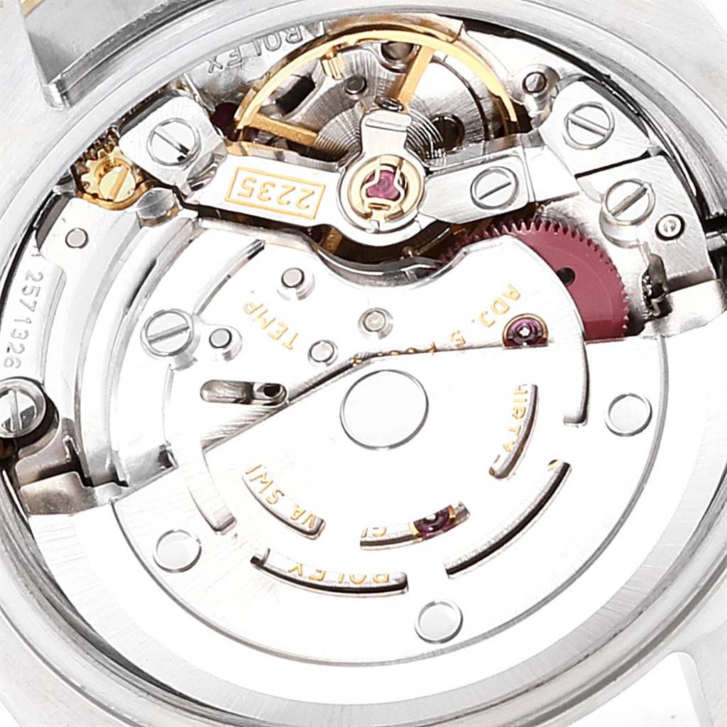 The image shows a close-up view of the movement mechanism of a Rolex Datejust 179173 Women's Steel and Gold (two tone) Mother of Pearl Dial 179173 Women's Steel and Gold (two tone) Mother of Pearl Dial watch.