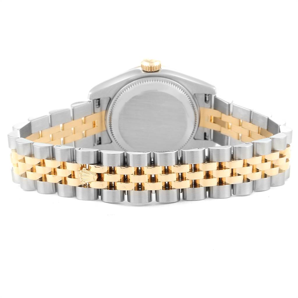 The image shows the back view of a Rolex Datejust 179173 Women's Steel and Gold (two tone) Mother of Pearl Dial 179173 Women's Steel and Gold (two tone) Mother of Pearl Dial watch, highlighting its case, crown, and two-tone Jubilee bracelet.