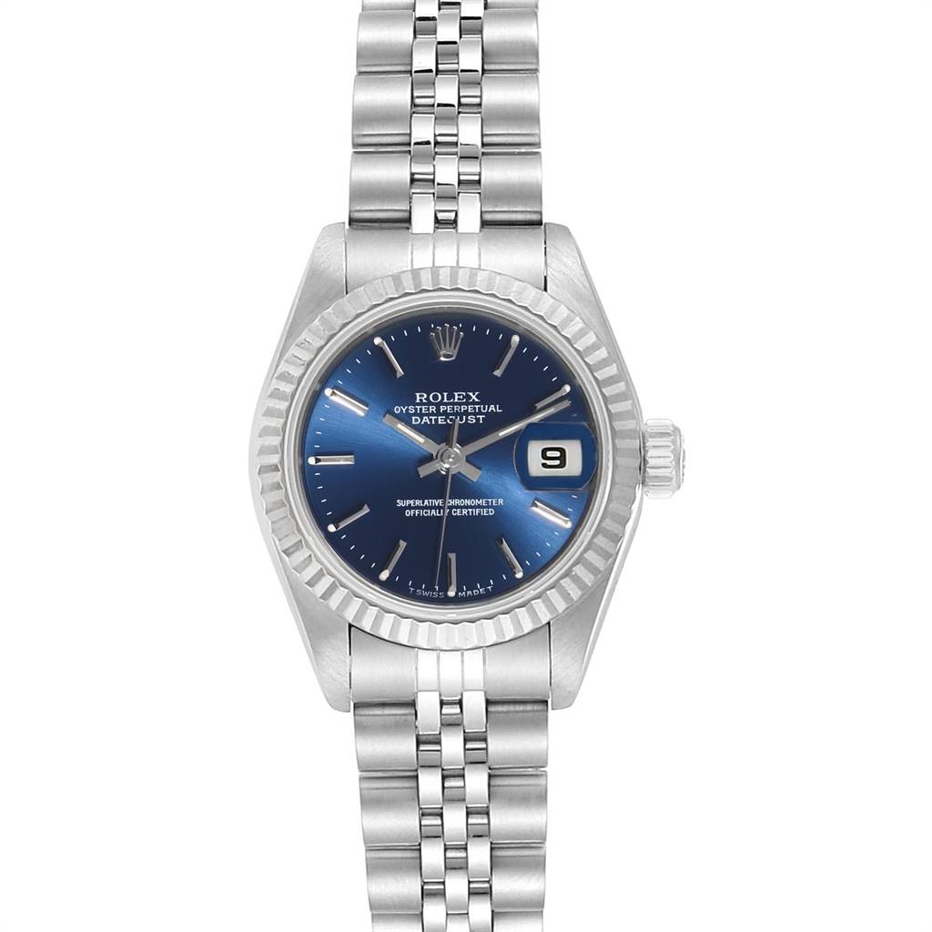 The image shows a front view of a Rolex Datejust 69174 Women's Stainless Steel Blue Dial 69174 Women's Stainless Steel Blue Dial watch, featuring its blue dial, fluted bezel, and Jubilee bracelet.