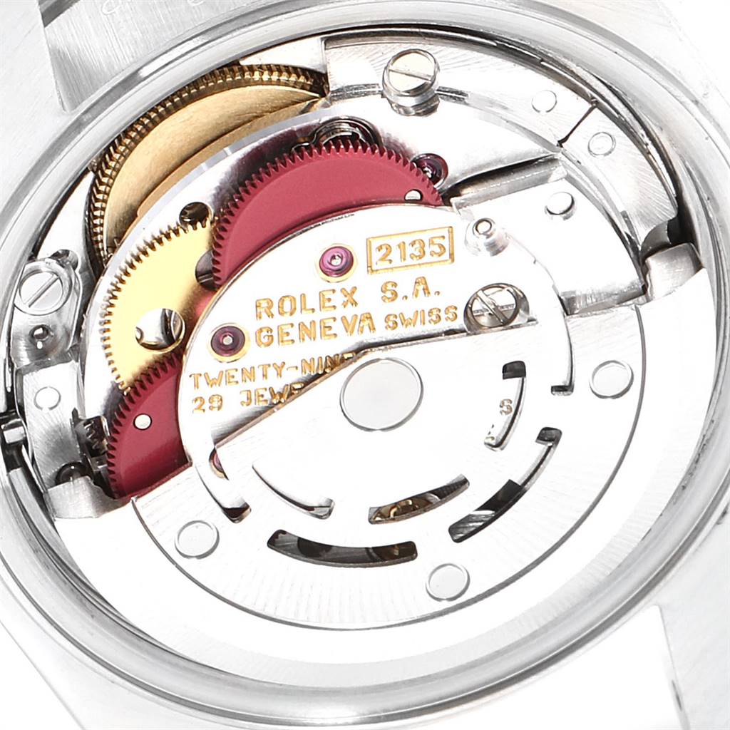 This image shows the internal mechanical movement of the Rolex Datejust 69174 Women's Stainless Steel Grey Dial 69174 Women's Stainless Steel Grey Dial watch, focusing on the gears and intricate components.