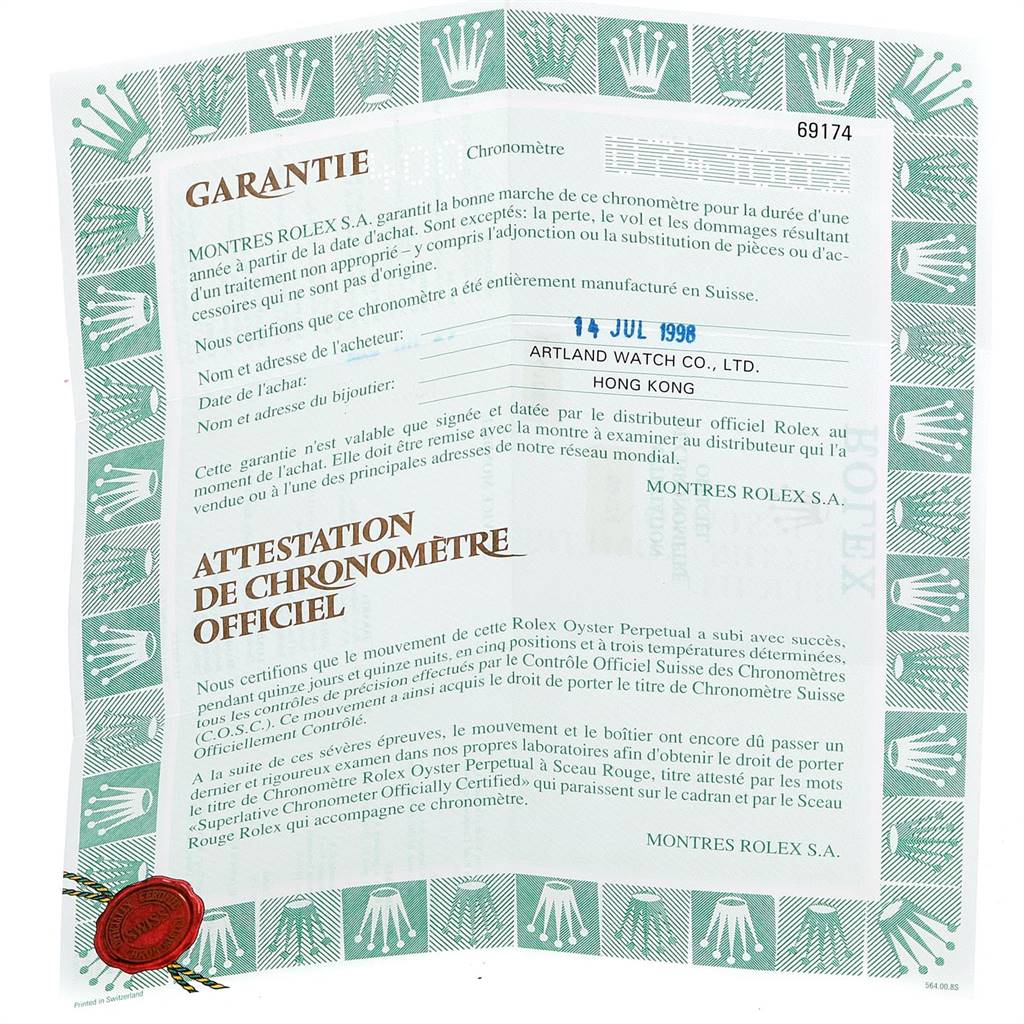 This is a warranty certificate and chronometer certification for a Rolex Datejust 69174 Women's Stainless Steel Grey Dial 69174 Women's Stainless Steel Grey Dial watch.