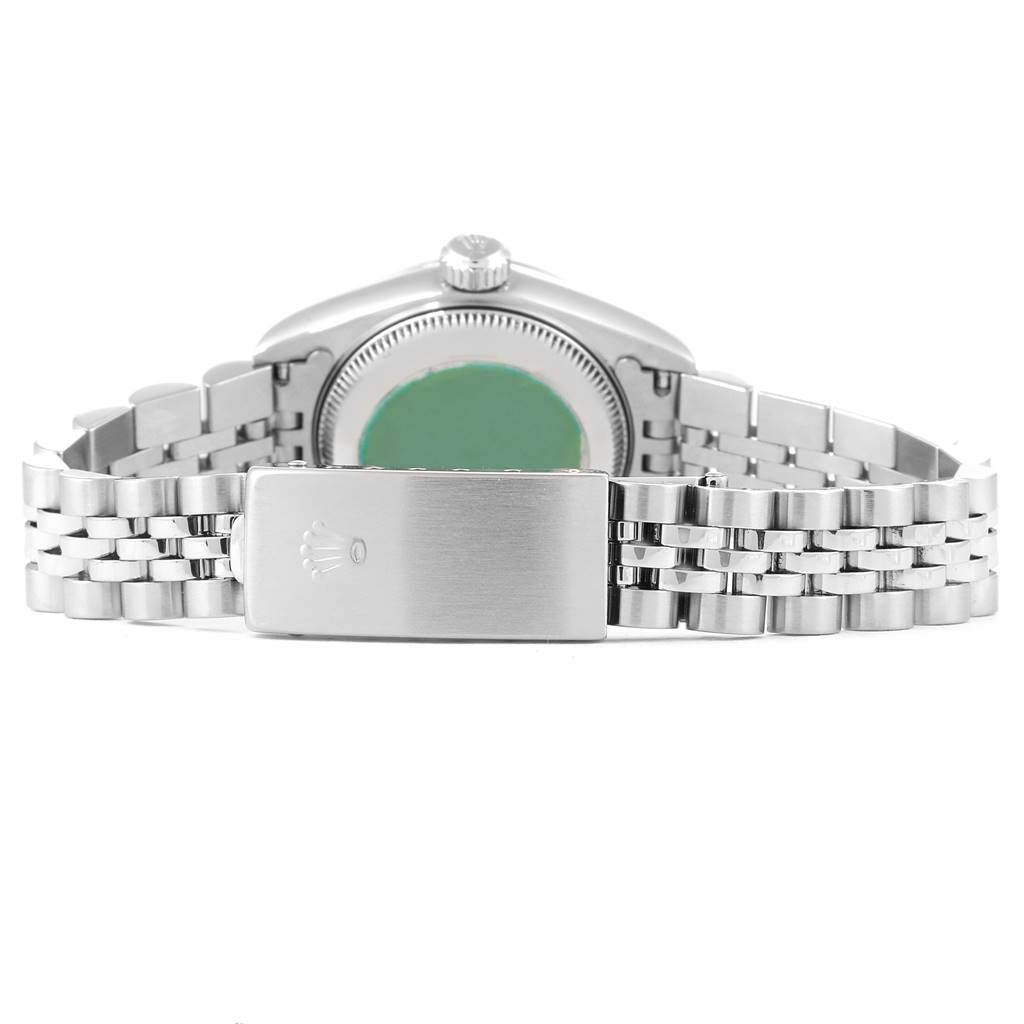 This image shows the Rolex Datejust 69174 Women's Stainless Steel Grey Dial 69174 Women's Stainless Steel Grey Dial watch from the back, highlighting the case back and the bracelet with the clasp visible.