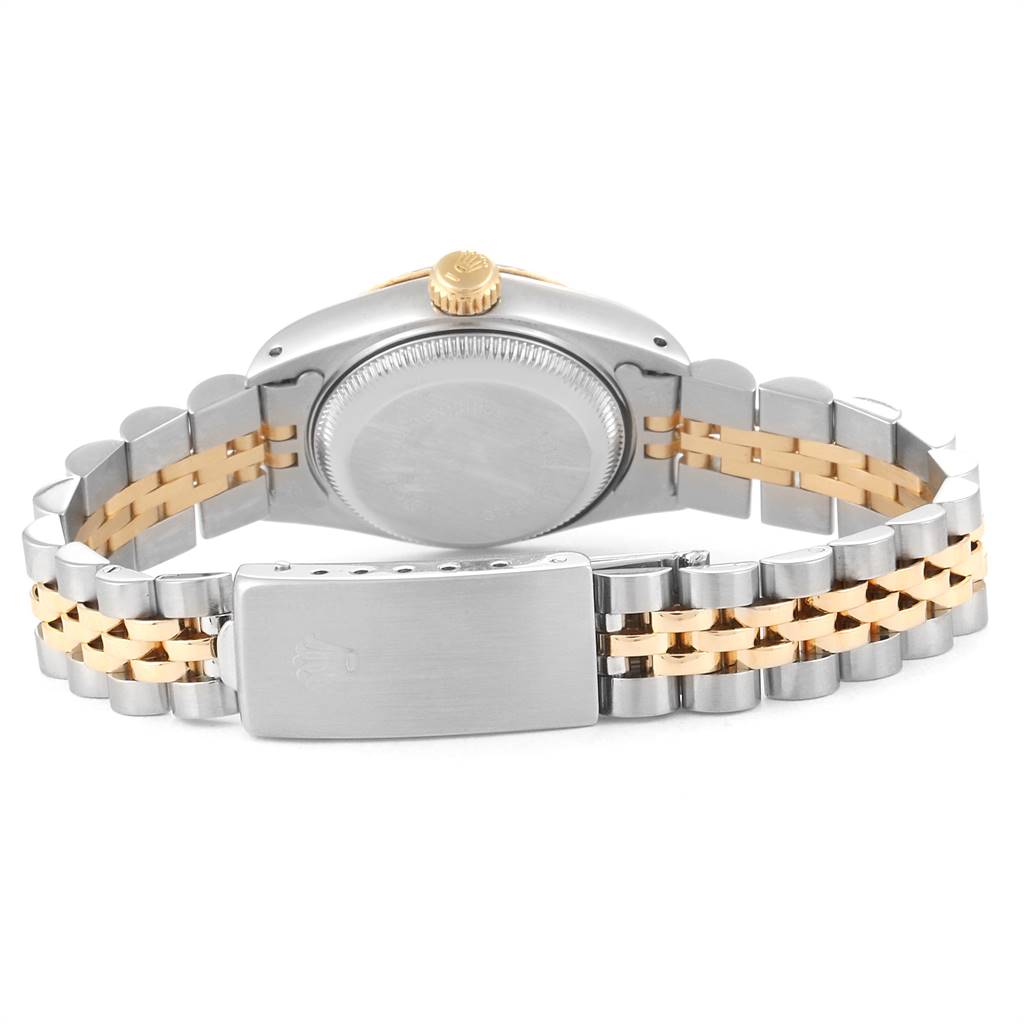 The image shows the back of a Rolex Datejust 69173 Women's Stainless Steel Champagne Dial 69173 Women's Stainless Steel Champagne Dial watch, highlighting its case back, Jubilee bracelet, and clasp.