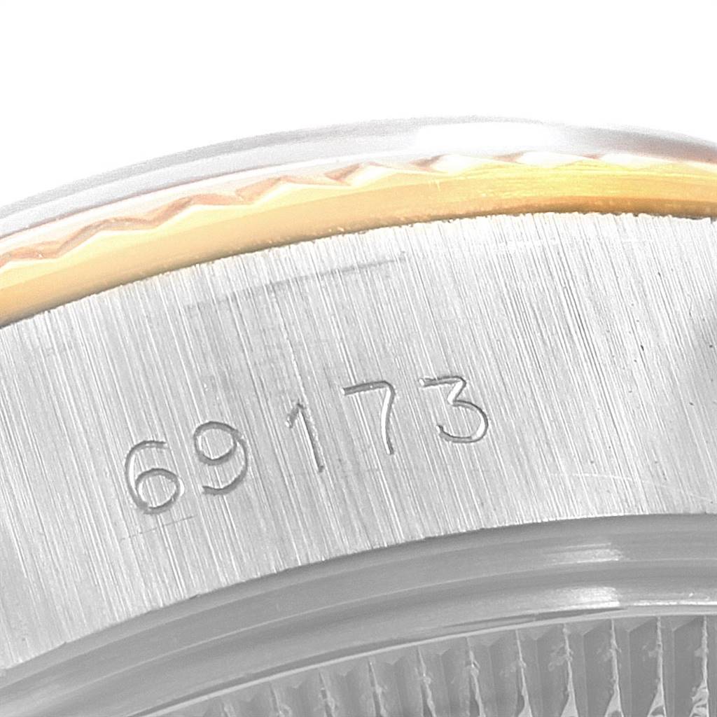 This image shows a close-up view of the model number "69173" inscribed on the side of the Rolex Datejust 69173 Women's Stainless Steel Champagne Dial 69173 Women's Stainless Steel Champagne Dial watch case.