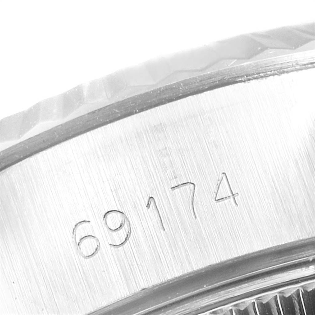 The image shows a close-up of the case back and reference number "69174" of a Rolex Datejust 69174 Women's Stainless Steel Blue Dial 69174 Women's Stainless Steel Blue Dial watch.