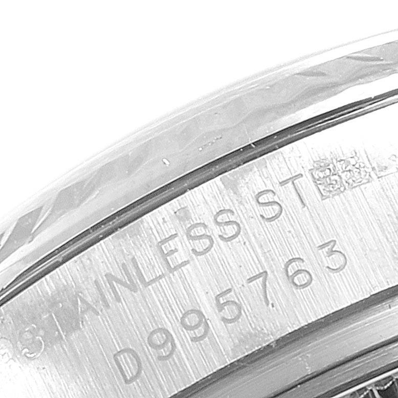 This image shows a close-up of the serial number and stainless steel material markings on the back of a Rolex Datejust 179174 Women's Stainless Steel White Dial 179174 Women's Stainless Steel White Dial watch.