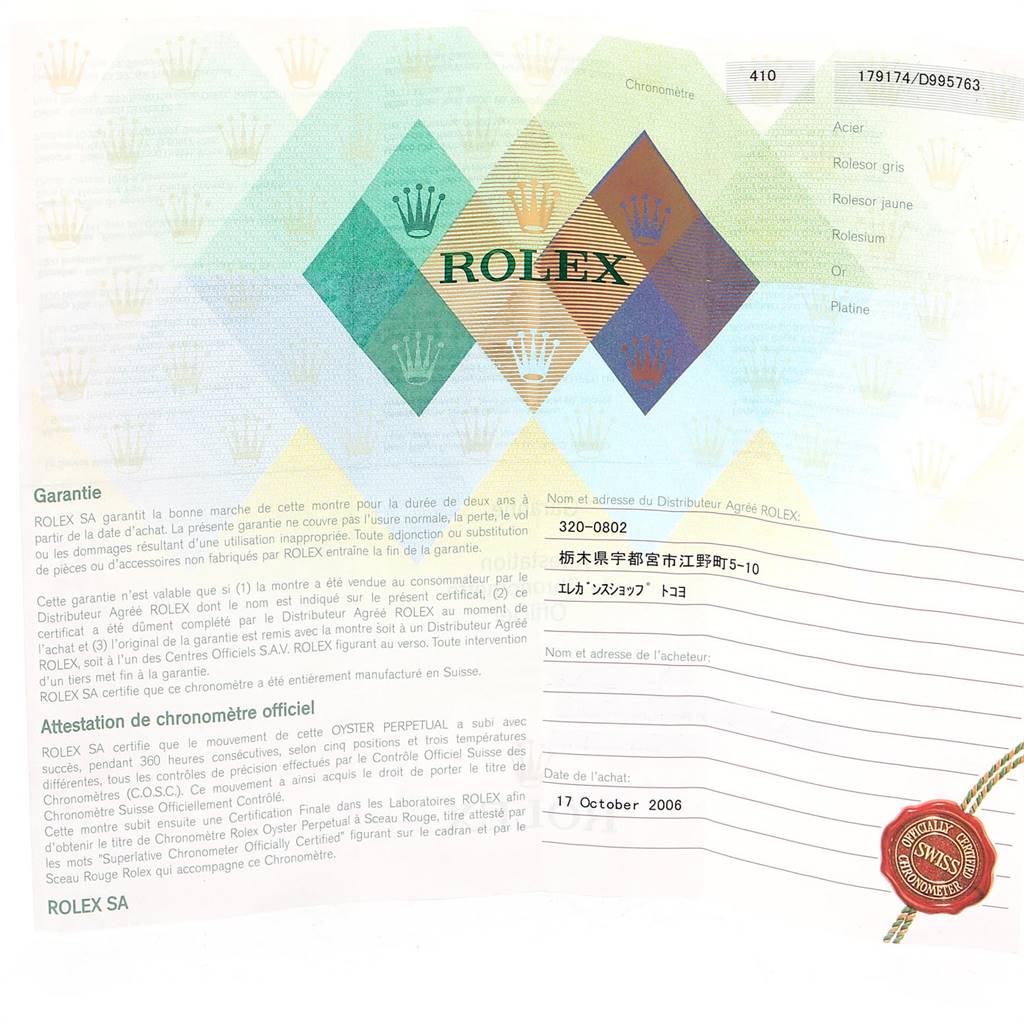 This image shows the warranty card and official chronometer certificate for the Rolex Datejust 179174 Women's Stainless Steel White Dial 179174 Women's Stainless Steel White Dial model.