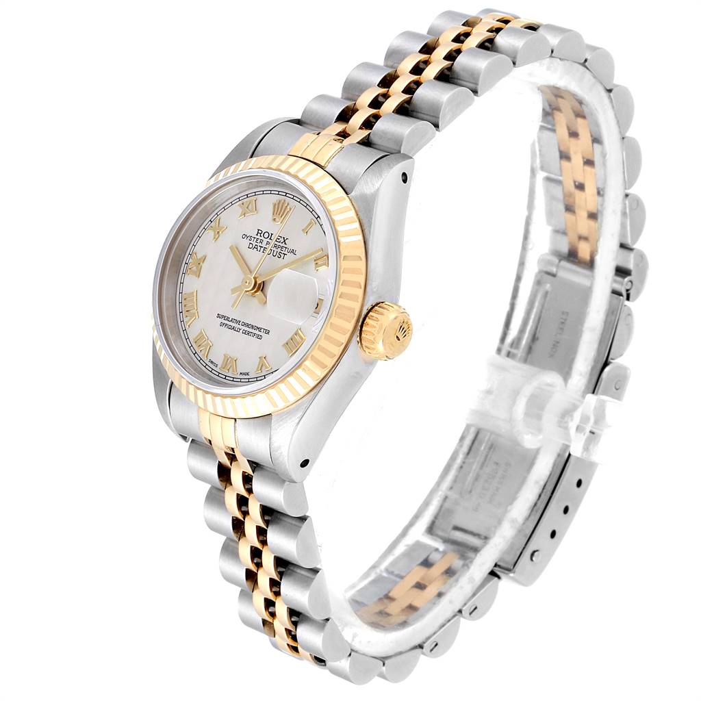 This image shows a side view of a Rolex Datejust 69173 Women's Stainless Steel Beige Dial 69173 Women's Stainless Steel Beige Dial watch, highlighting its dial, crown, and two-tone jubilee bracelet.