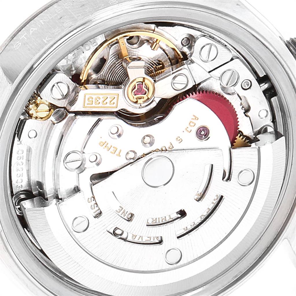 This image shows a close-up of the internal mechanism of a Rolex Datejust 79174 Women's Stainless Steel Blue Dial 79174 Women's Stainless Steel Blue Dial watch.