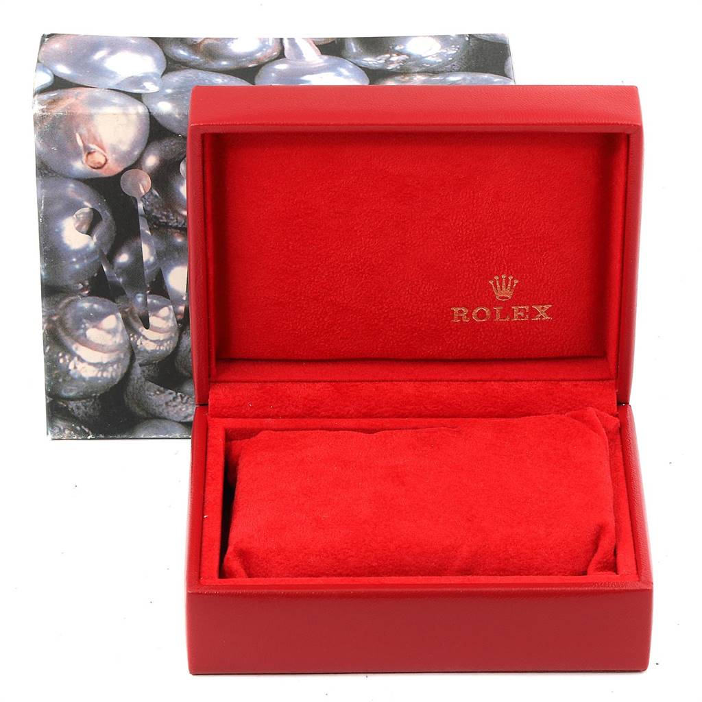 The image shows a red Rolex Datejust 69173 Women's Stainless Steel Silver Dial 69173 Women's Stainless Steel Silver Dial watch box, open to reveal the cushioned interior.