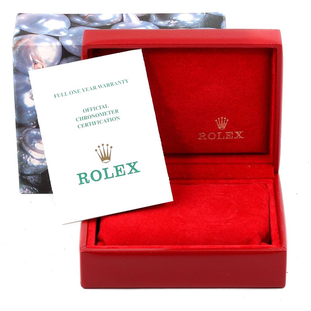 The image shows a red Rolex watch box and official documentation for the Datejust model.