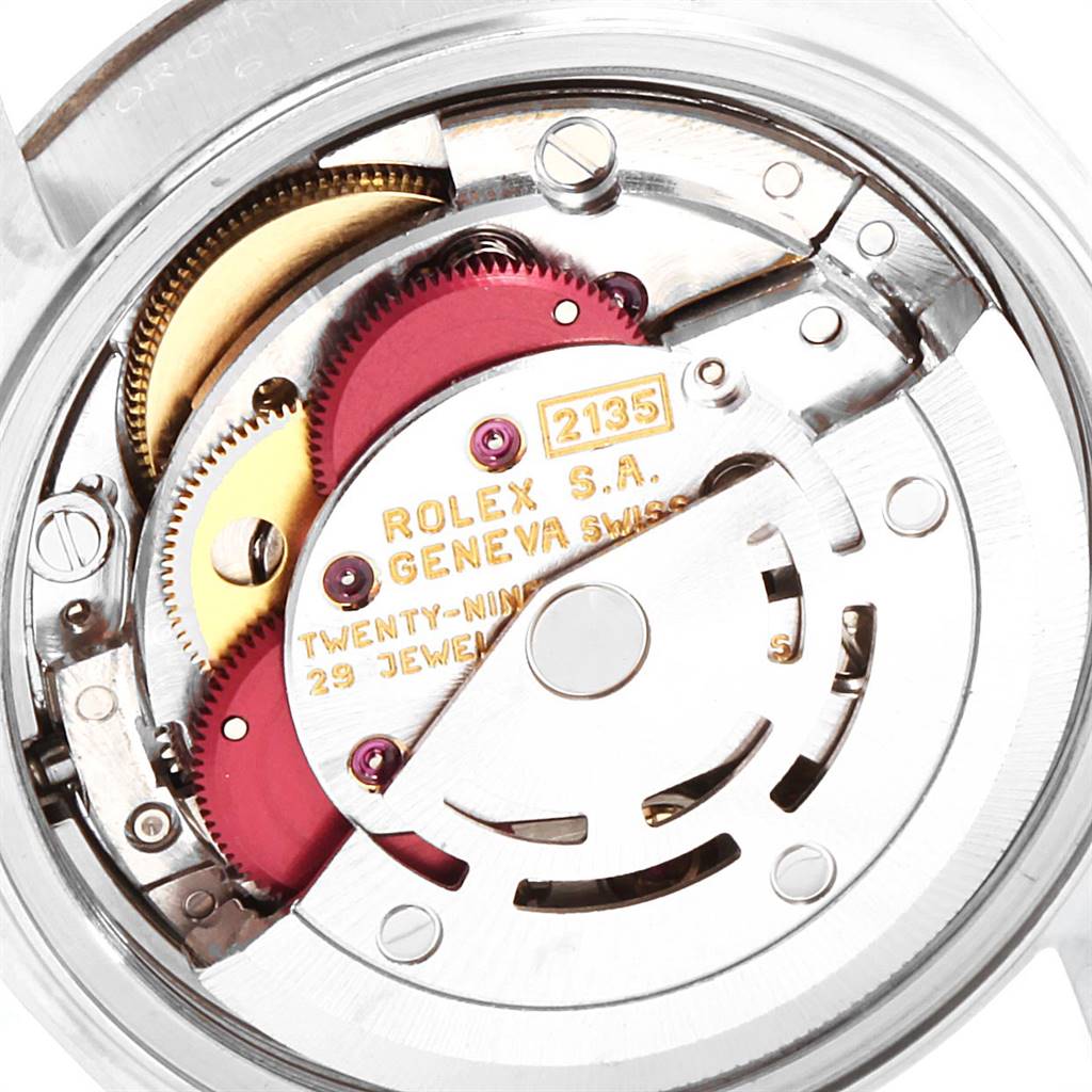 This image shows the movement mechanism of a Rolex Datejust 69174 Women's Stainless Steel White Dial 69174 Women's Stainless Steel White Dial watch, highlighting gears and internal components.
