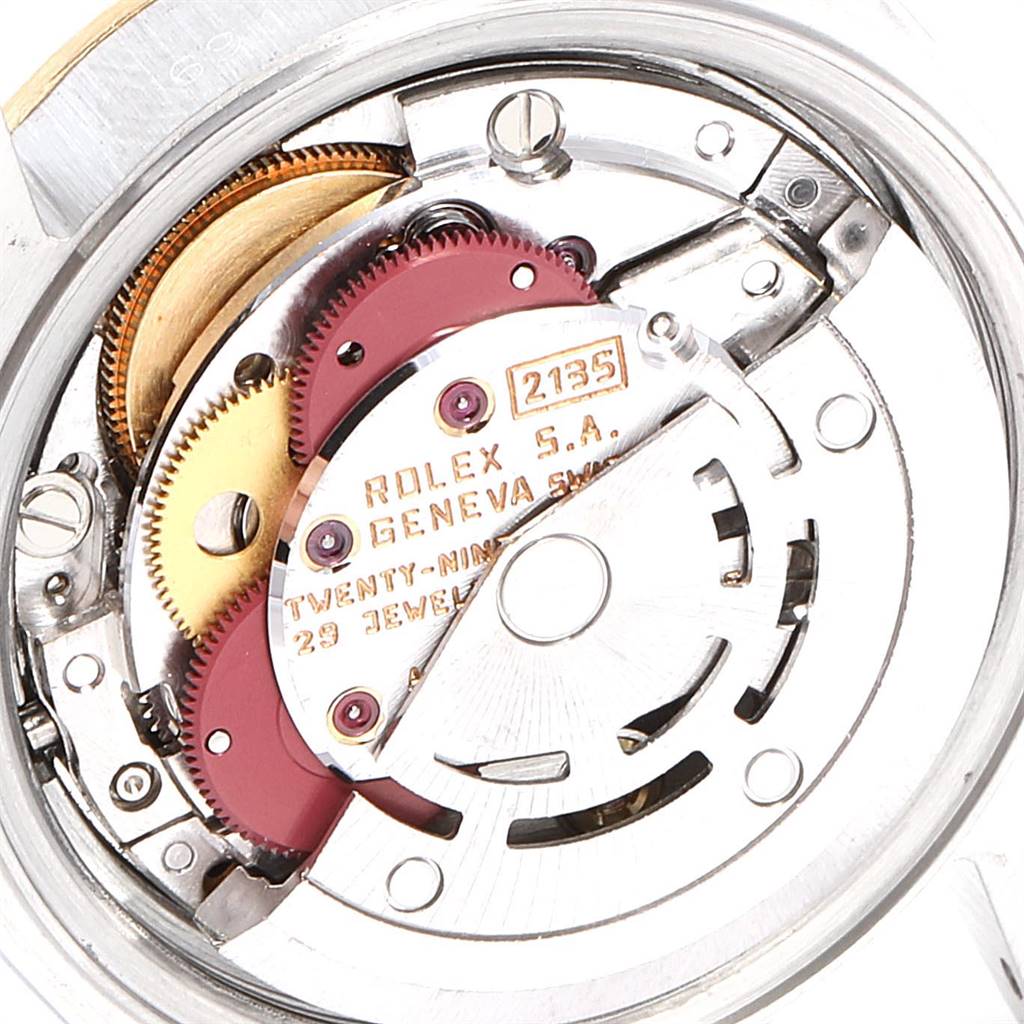 This image shows the detailed internal movement of a Rolex Datejust 69173 Women's Stainless Steel White Dial 69173 Women's Stainless Steel White Dial watch, highlighting its gears and components.