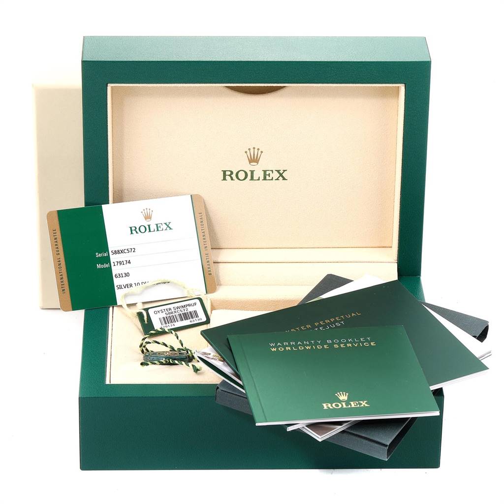 The image shows an open box for a Rolex Datejust 179174 Women's Stainless Steel Silver Dial 179174 Women's Stainless Steel Silver Dial watch, including warranty booklets, the watch tag, and the serial/model card.