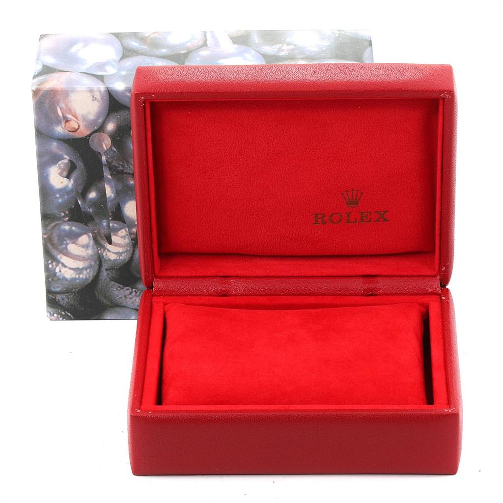 This image shows an open red Rolex watch box designed to hold the Datejust model.